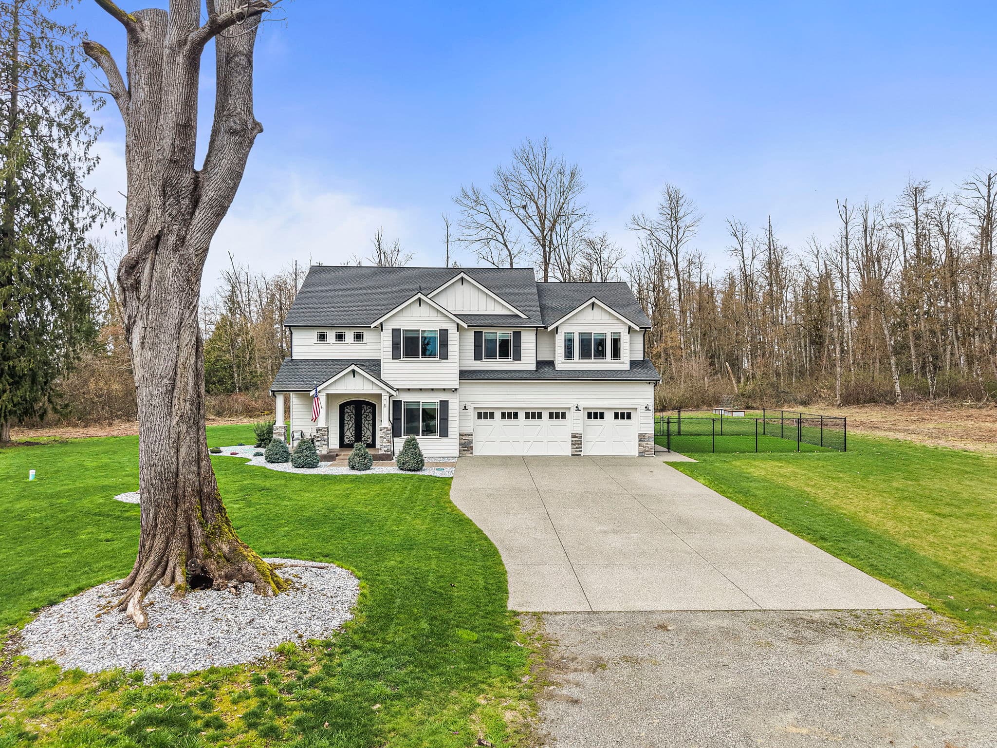 Aerial view of Enumclaw Forest Estate surrounded by private forest